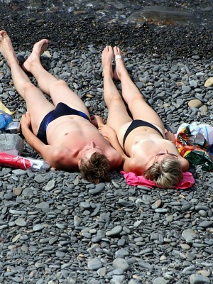 Shameless nudists having fun at the beach