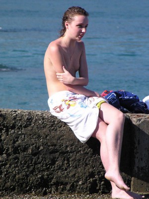 Teen girl caught topless at the public beach